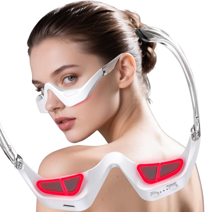 The glasses with all four contact pads lit red, worn and shown close up