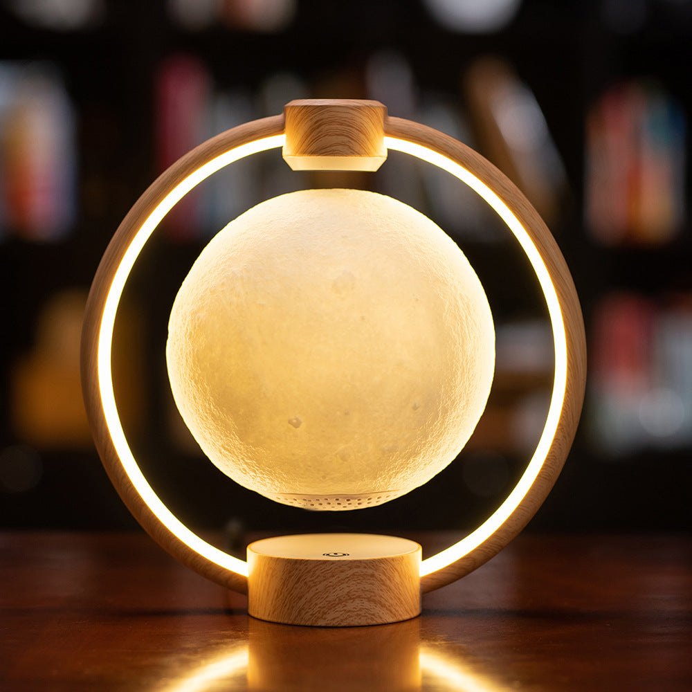 Maglev moon light glowing on a shelf